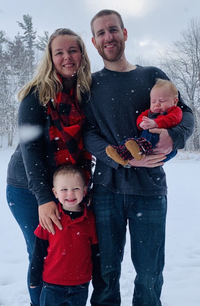 Family picture of Author, husband, little boy and baby boy.